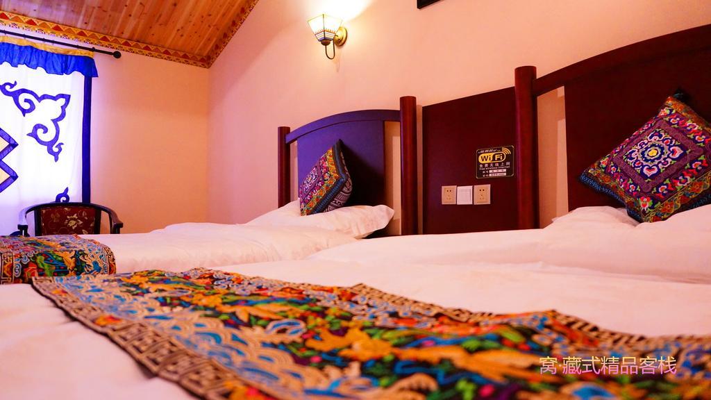 Wo Home Hostel Jiuzhaigou Quarto foto